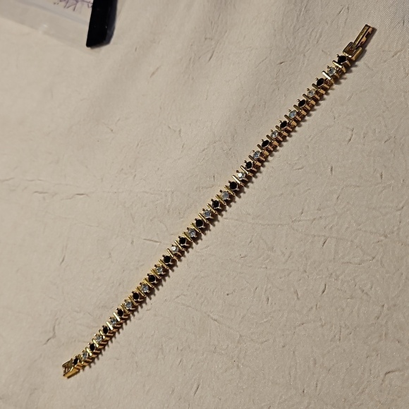 NAPIER Vintage Rhinestones, Black Stones, and Gold Tone Tennis Bracelet - Picture 1 of 10